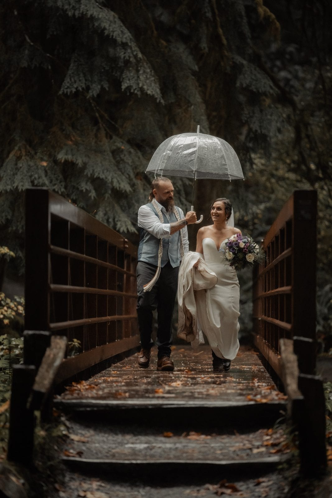 A kiss under the umbrella in the rain