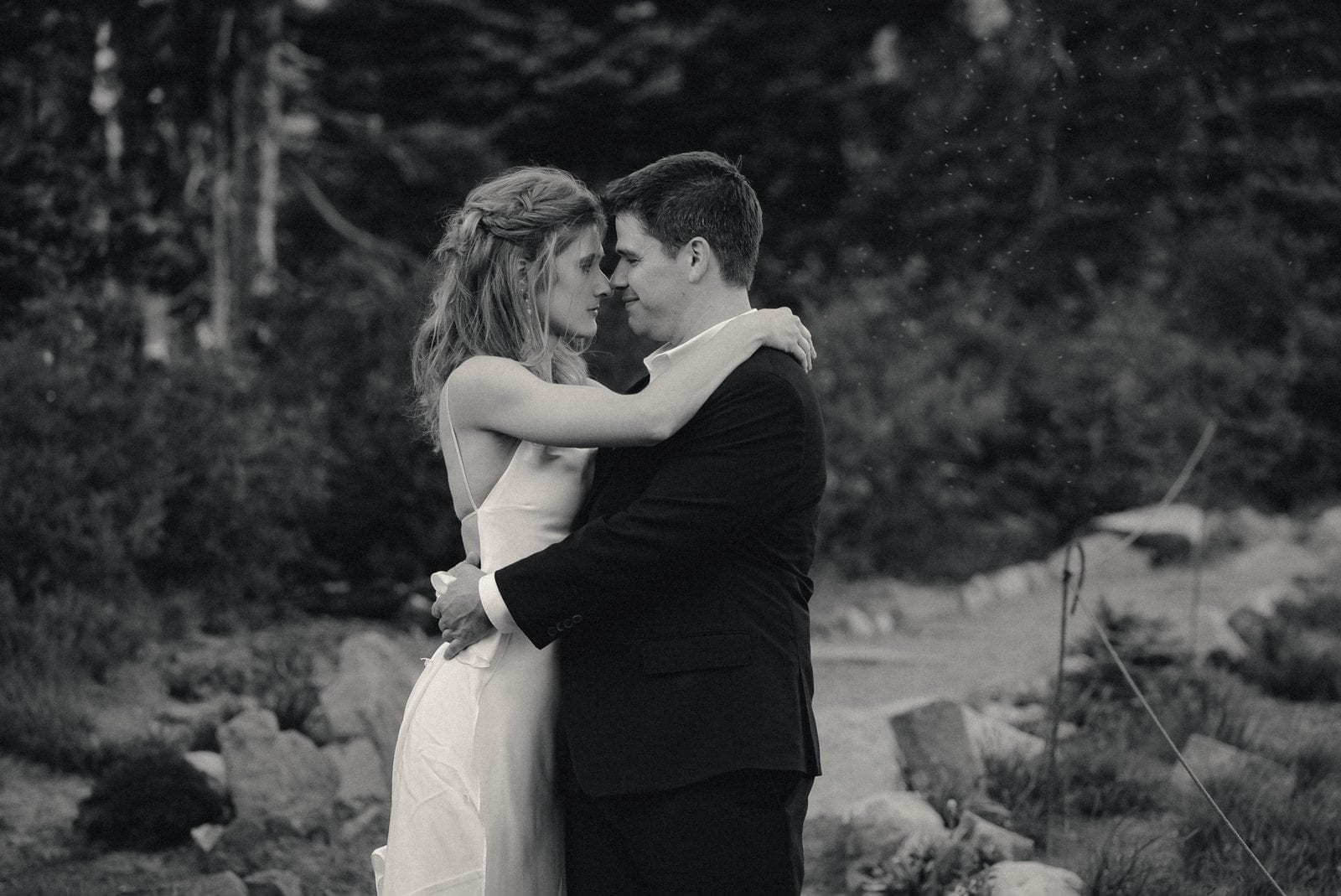The couple embracing, black and white