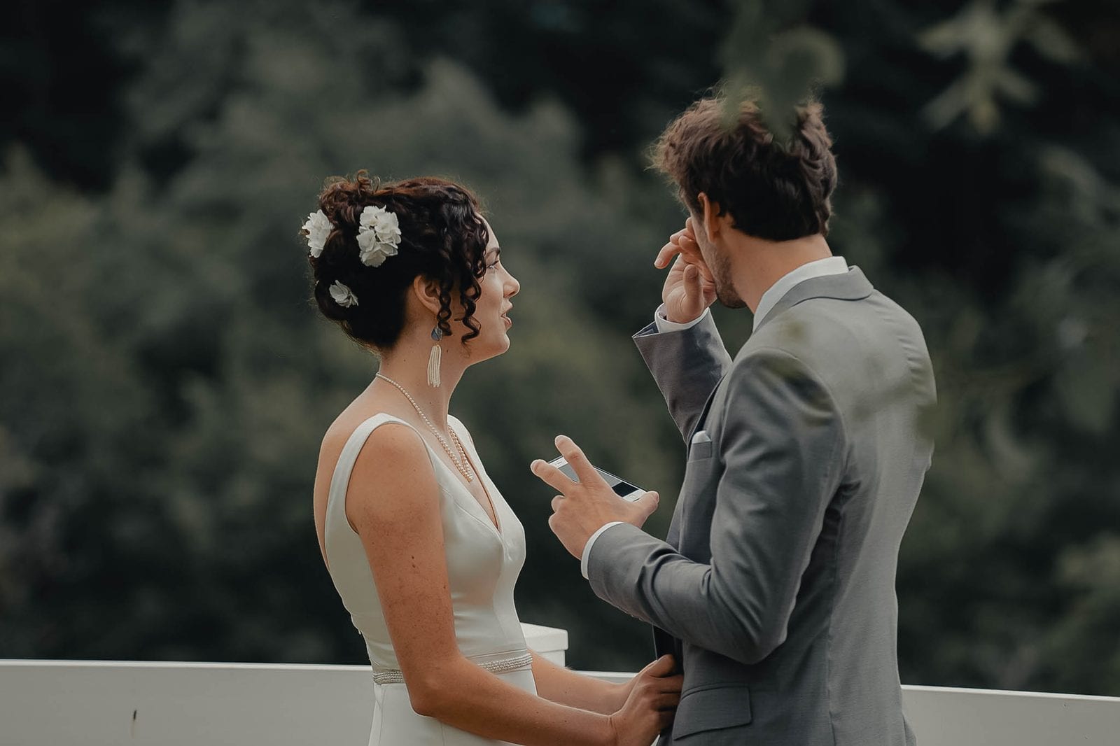 Exchanging vows during the ceremony