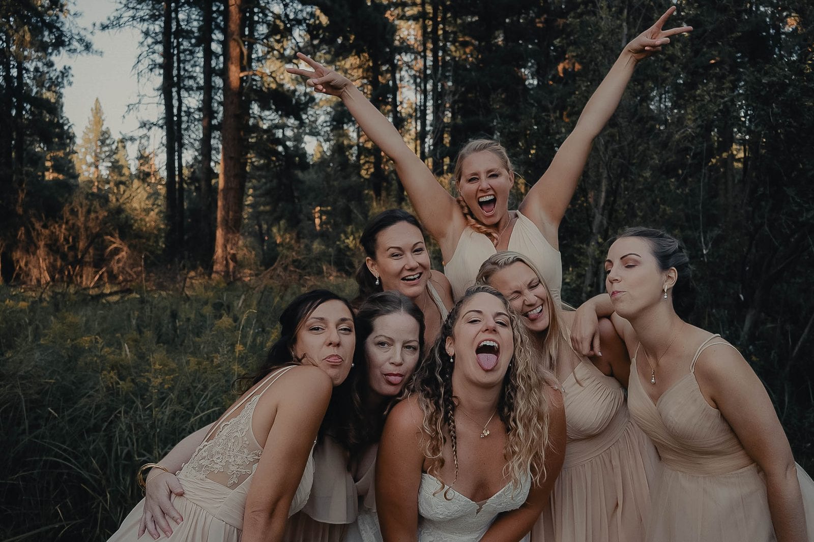 The bridesmaids being playful at golden hour